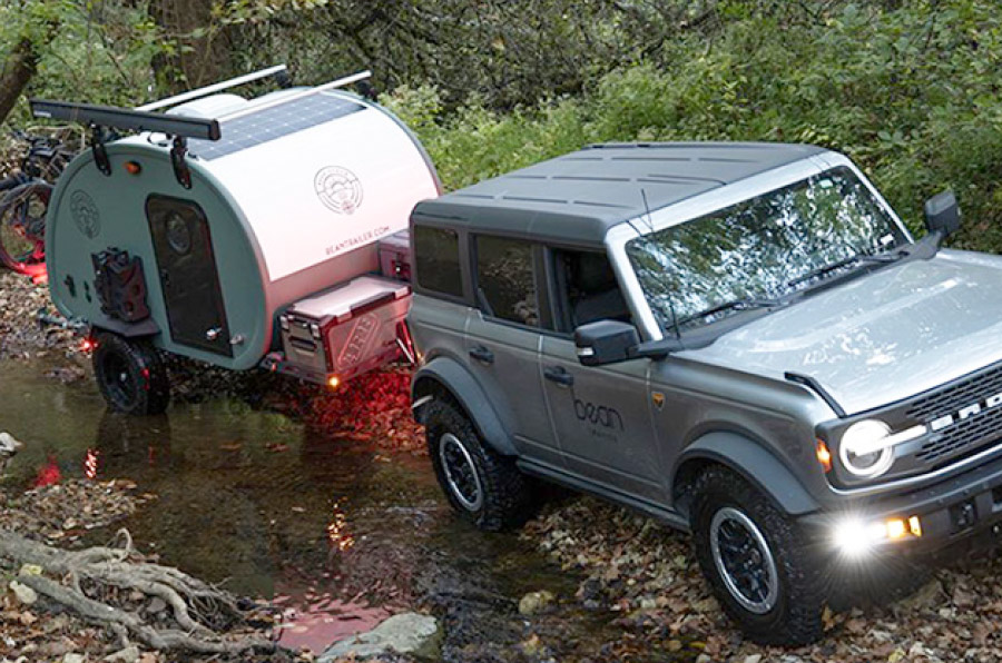 Bean Trailer being pulled by Bronco through water