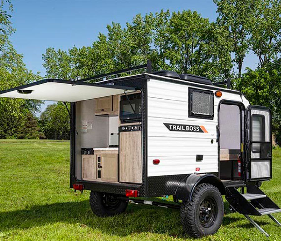 view of Gulf Stream Coach Trail Boss RV trunk open