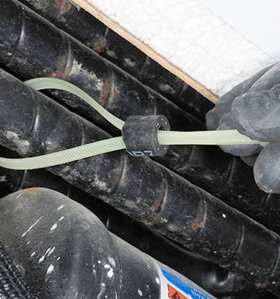 heat-resistant cable ties being used to secure the devices