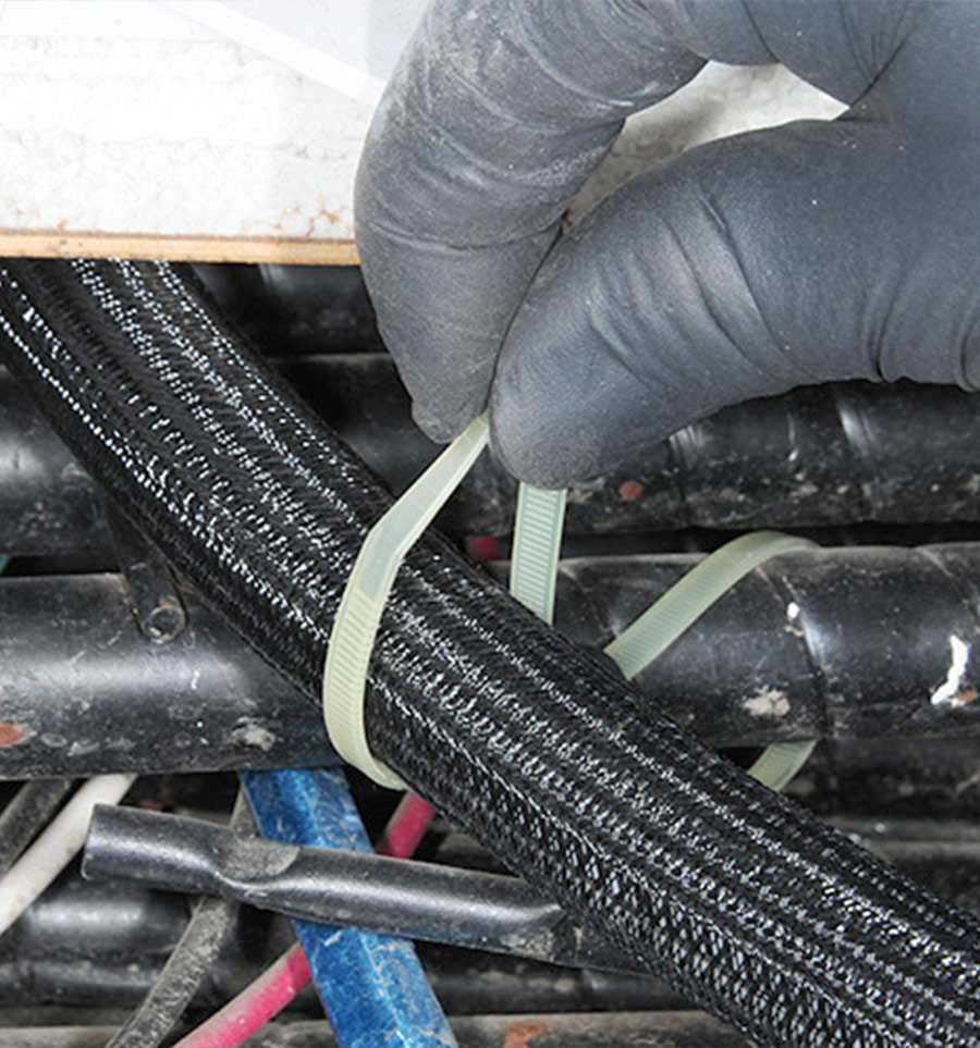 heat-resistant cable tie being attaches to device