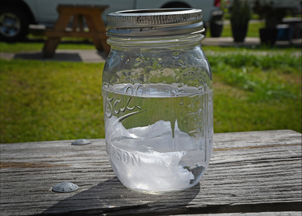 Dometic toilet paper in water in a mason jar