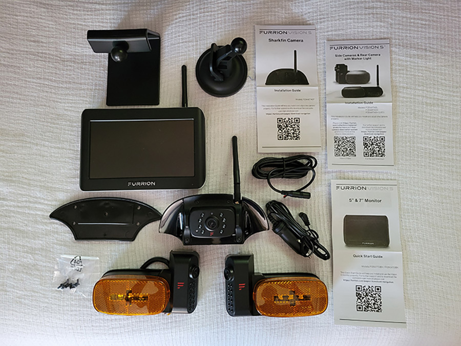 Portrait photograph close-up view of Lippert’s Furrion Vision S RV, which is a complete kit that comes with a Sharkfin backup camera, two side cameras and the requisite hardware; The instructions are very good, making this kit DIY friendly.