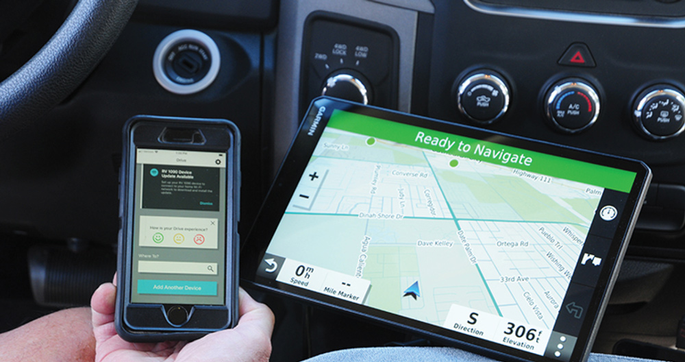 smart phone next a GPS tablet