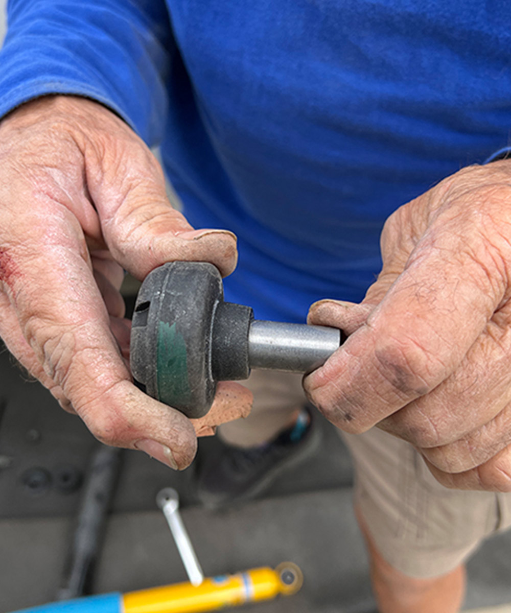 a bearing sleeve is inserted into the rubber bushing on a Bilstein front shock